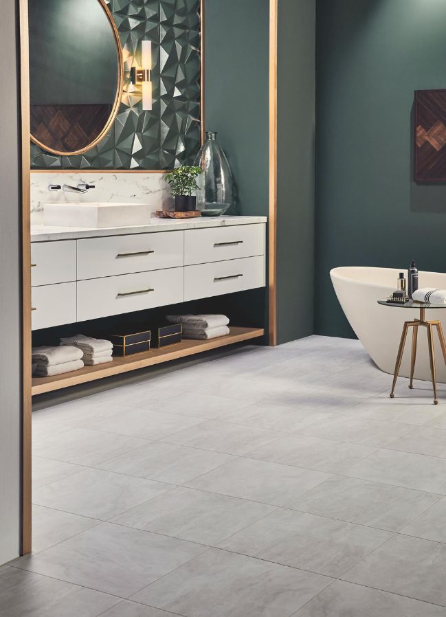 grey luxury vinyl tile flooring in a large bathroom