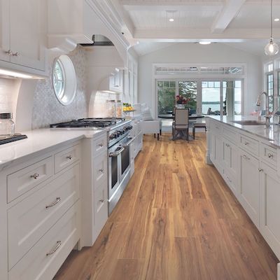 wood look laminate floors in a bright open kitchen