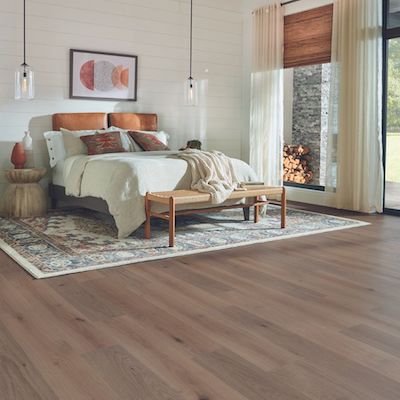 wood look laminate floors in a rustic bedroom